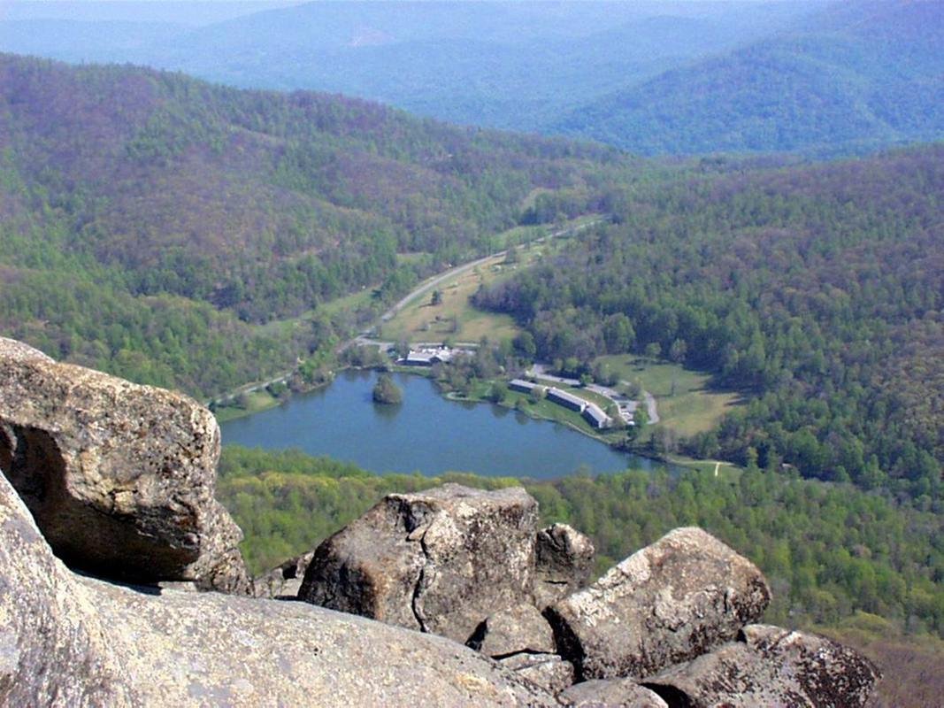 Sharp Top Mountain Peak provides a sweeping view, overlooking the Peaks of Otter lodge and Abbott Lake.